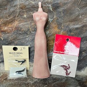 Doll house accessories. 2 pairs of shoes and a statue